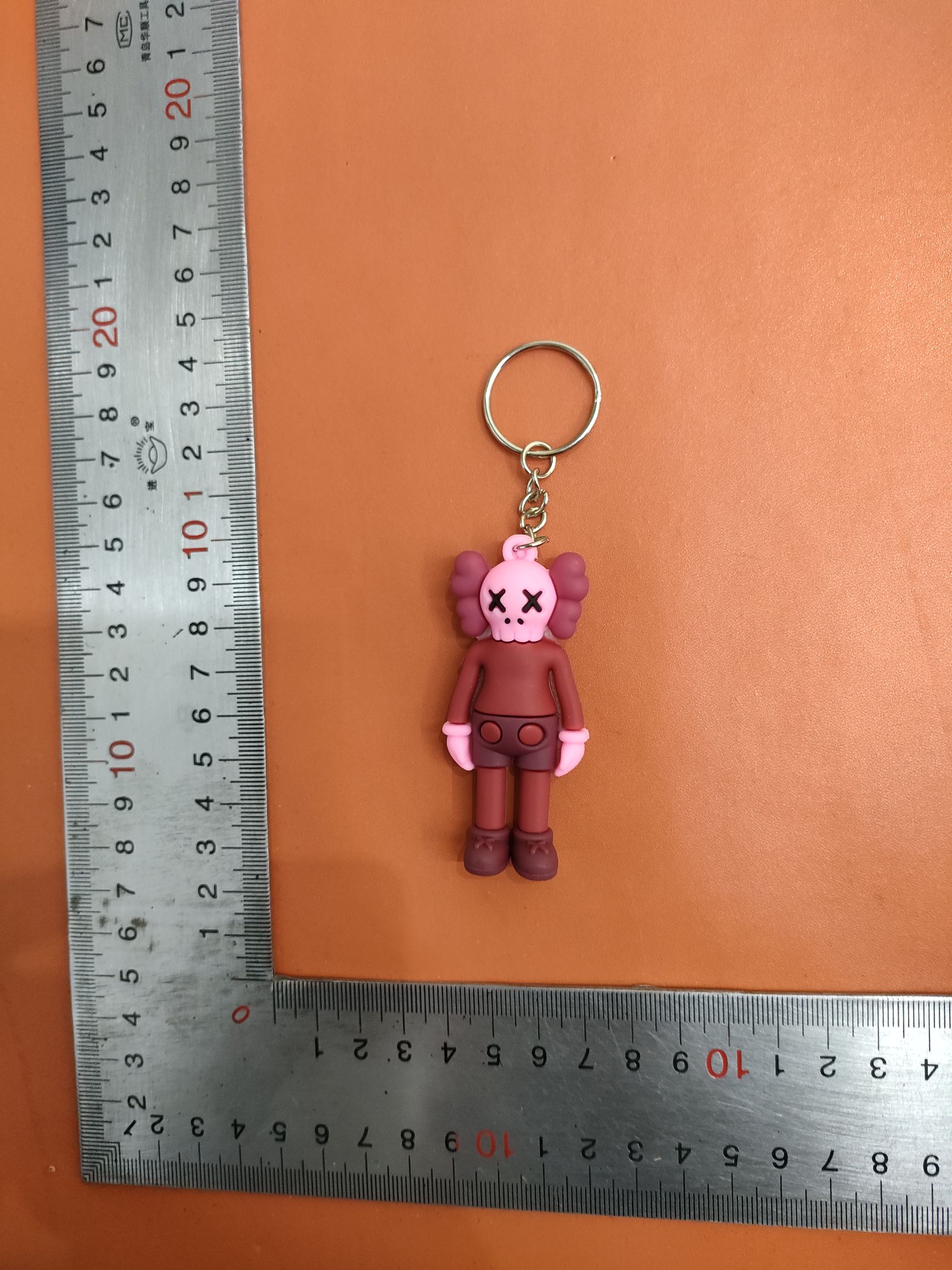 A personal sesame sesame keyring kaws key button and a bun-packed gift.