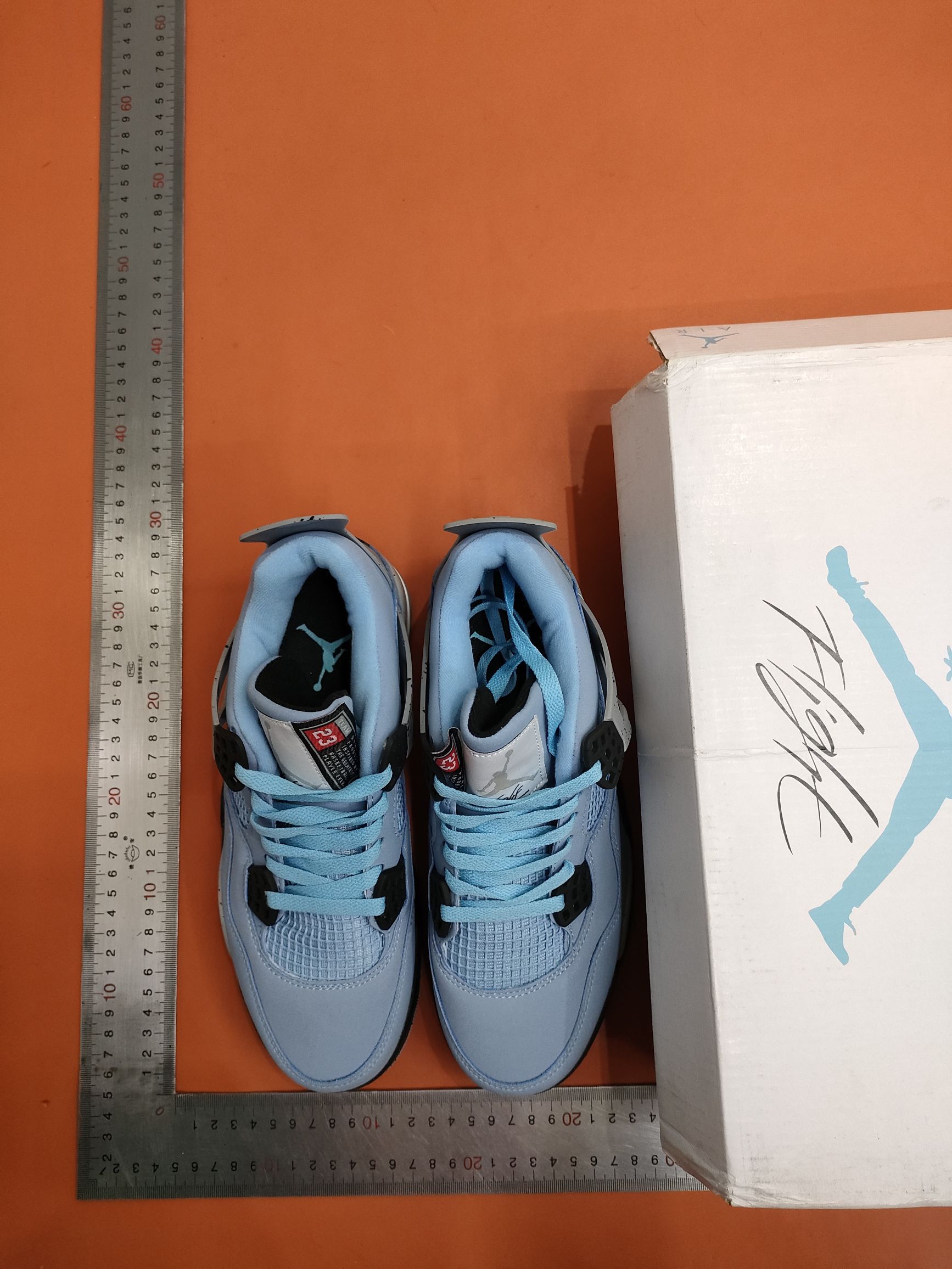 Blue-and-white-coloured blue-coloured-and-white-coloured-coloured, white-and-white-coloured, male and female sports shoes.